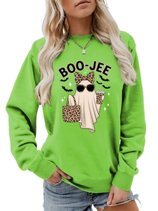 Detail of creative ghost print with leopard bow and sunglasses on bright green sweatshirt