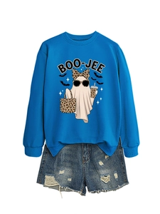 Detail of blue boo-jee ghost sweatshirt paired with distressed denim shorts