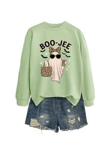 Detail view of Boo-Jee ghost print on light green sweatshirt with leopard pattern accents