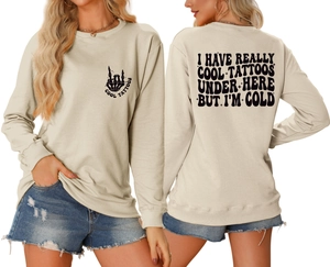 Front and back detail of beige sweatshirt with I HAVE REALLY COOL TATTOOS slogan