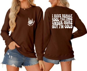 Detailed front and back views of a dark brown sweatshirt with white graphic bone prints