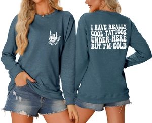 Front and back views of a charcoal grey crewneck sweatshirt with cool tattoos print