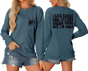 Detailed front and back view of blue-grey sweatshirt with vintage cool tattoos text print