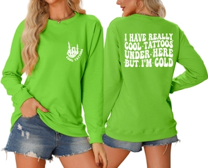 Detailed views showing front print and back quote on neon green crewneck sweatshirt