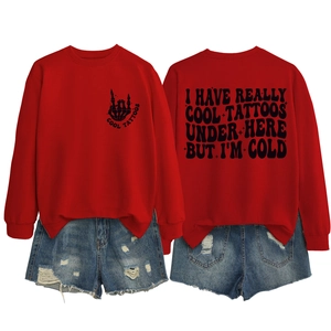 Detailed front and back view of red crewneck sweatshirt with cool tattoo slogans