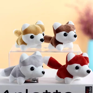 Set of four mini plush husky puppy keychains in brown, grey and tan for bag decor