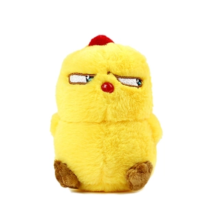 Funny yellow chick plush keychain with quirky expression and red crown on white background