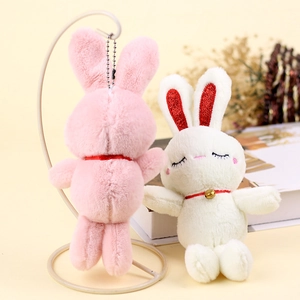 Cute pink and white plush bunny keychains with soft fur and metal bead chains