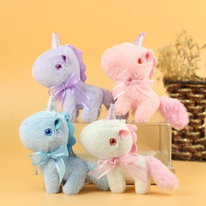 Cute unicorn plush keychain set in pastel colors with glitter horns and organza bows