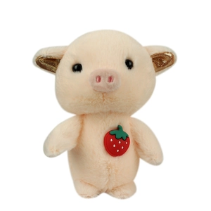 Cute beige plush pig keychain with golden glitter ears and a small red strawberry
