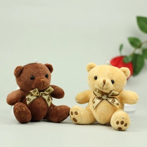 Cute plush teddy bear keychain charms in brown and beige with satin bow ties