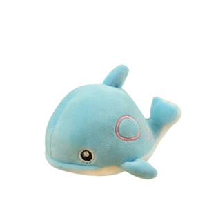 Cute light blue whale plush pendant with soft fabric and pink embroidery on white background