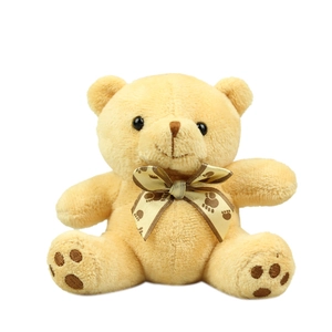 Cute beige plush teddy bear doll with silk ribbon bow accessory for bag decoration