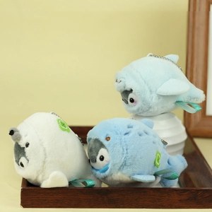 Cute plush penguin charms in ocean-themed costumes with silver bead chain keyrings