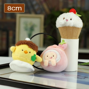 Detailed view of 8cm plush charms showing cute chick, peach, and cupcake bunny designs