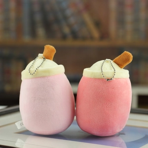 Detail of pink milk tea plush keychains with metal chains and CE safety labels