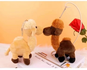 Cute camel plush keychains in brown and beige colors with soft texture and metal chains