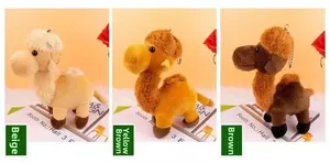 Three plush camel keychains in beige, yellow-brown and deep brown soft faux fur texture