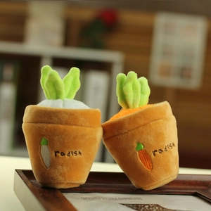 Detail of plush radish dolls with embroidery in a cozy home setting with wooden tray