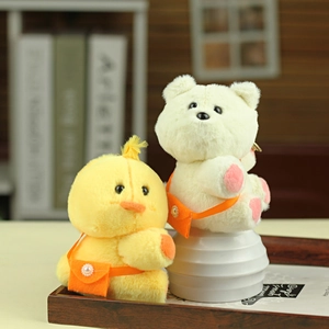 Cute plush yellow duck and white bear keychains with orange mini bags for backpacks