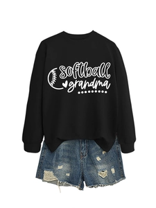 Close-up of softball grandma print on black long sleeve sweatshirt and denim shorts