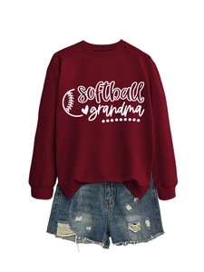 Detail of burgundy softball grandma sweatshirt paired with distressed blue denim shorts