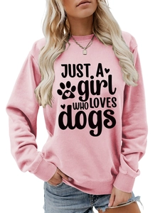 Detail of pink crewneck sweatshirt featuring Just a Girl Who Loves Dogs print and ribbed cuffs