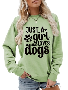 Detail of sage green sweatshirt featuring Just a Girl Who Loves Dogs print and ribbed cuffs