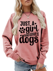 Close-up of ribbed cuffs and JUST A girl WHO LOVES dogs print on mauve sweatshirt