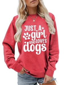 Close-up of ribbed cuffs and white 'Just a Girl Who Loves Dogs' print on red sweatshirt