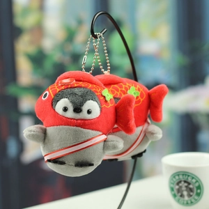 Cute penguin plush keychain in red fish costume with silver bead chain on display stand
