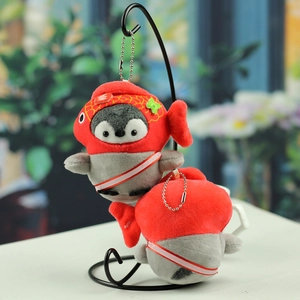 Detailed plush penguin pendant featuring a red koi fish hat and silver keychain chain