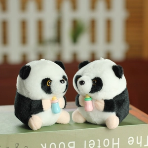 Plush panda keychain with colorful milk bottles on a book, cute bag hanging accessory