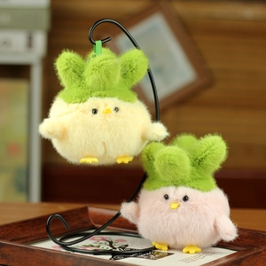 Cute plush chick keychain with green leaf sprout detail in yellow and pink colors