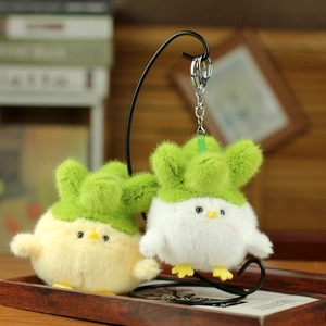 Detailed plush texture of cute cabbage chick keychains in a cozy lifestyle setting