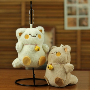 Close-up of cute plush cat keychains featuring metal bells and embroidery details