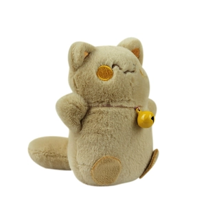 Cute plush lucky cat charm in beige with golden embroidery and a yellow bell ornament