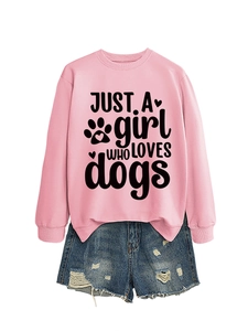 Detail of pink cotton sweatshirt with dog lover print and distressed denim shorts