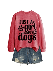 Detail of red crewneck sweatshirt with dog lover print and distressed denim shorts