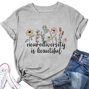 Close-up of Neurodiversity Is Beautiful print on gray crew neck floral T-shirt
