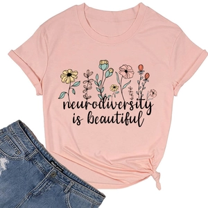 Macro view of pink Neurodiversity Is Beautiful floral tee with stylish front knot detail