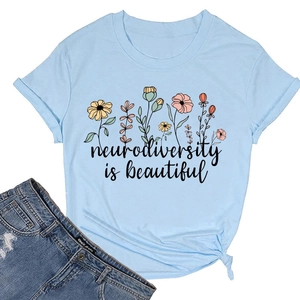 Detail of light blue t-shirt featuring floral print, typography and side knot waist tie