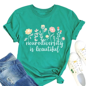 Close-up of teal crew neck t-shirt with floral print and neurodiversity text