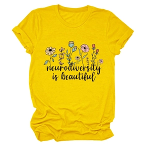 Detail of floral print and neurodiversity is beautiful text on yellow cotton T-shirt