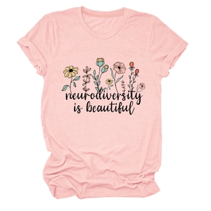 Pink crew neck t-shirt featuring colorful flowers and neurodiversity is beautiful text
