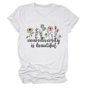 Close-up of white cotton T-shirt featuring neurodiversity is beautiful floral print