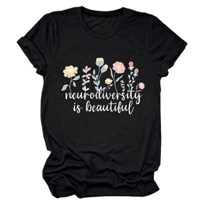 Detail of floral graphic and Neurodiversity is Beautiful text on black T-shirt