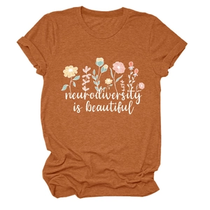 Detail of rolled sleeves and neurodiversity is beautiful floral print on cotton T-shirt