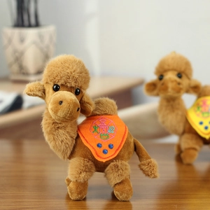 Detailed plush camel keychain with ethnic embroidery and soft faux fur texture