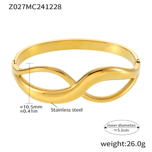 Macro detail of 10.5mm 18K gold-plated stainless steel wave cuff bracelet dimensions